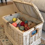 dog toy storage ideas Old laundry basket transformed into holder