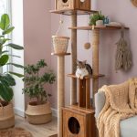 cat wall furniture Multi level wooden cat condos against wall