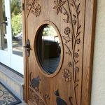 cat door ideas Wooden cat door with carved designs
