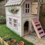 outdoor bunny habitat ideas Cottage themed playhouse with access