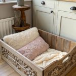 dog bed in farmhouse kitchen Decorative wooden box with fluffy bedding