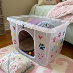 diy cat hideaway Plastic storage bin with cut out kitty door